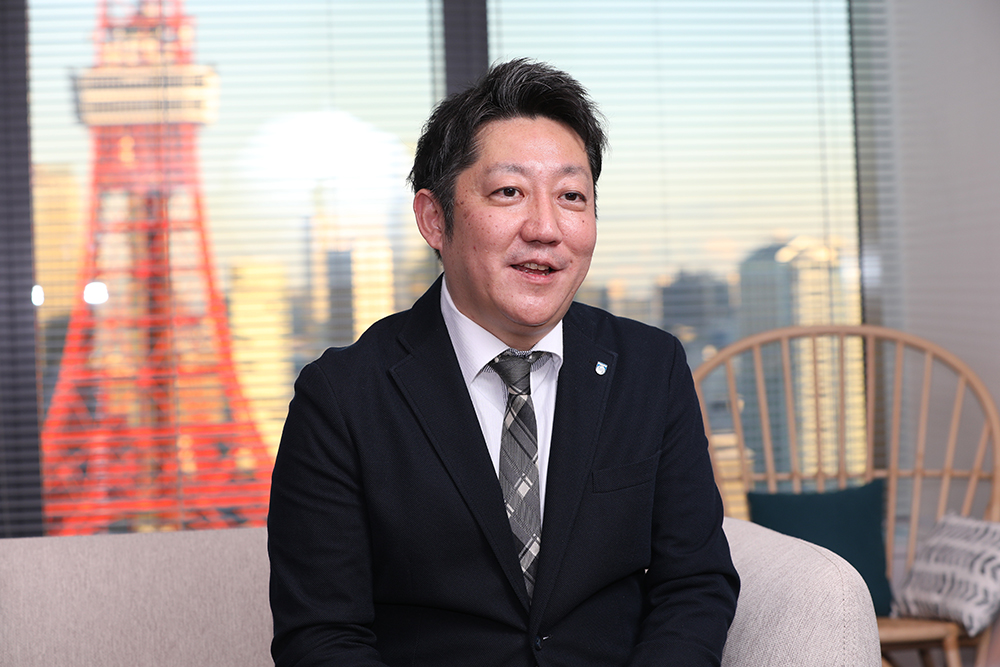 長岡 勝 氏